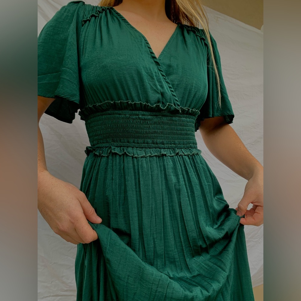 Great condition. No stains. Worn to two weddings.